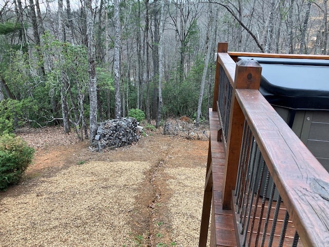 view of yard with a view of trees
