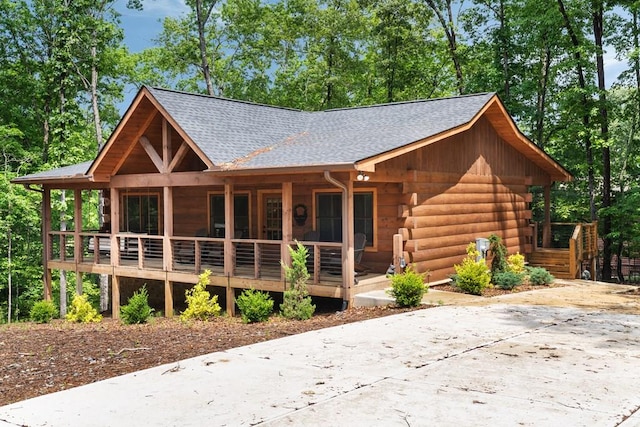 953 Lemmon Ln, Ellijay, GA 30540 - log-style house featuring a porch, roof with shingles, and log exterior