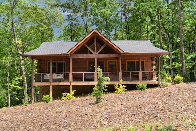 953 Lemmon Ln, Ellijay, GA 30540 - log cabin with log siding, covered porch, and roof with shingles