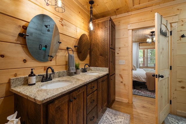 953 Lemmon Ln, Ellijay, GA 30540 - ensuite bathroom with wooden walls, wood ceiling, wood finished floors, double vanity, and a shower stall