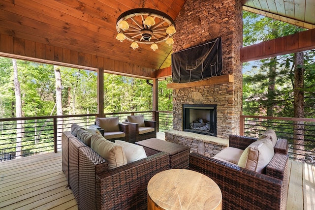 953 Lemmon Ln, Ellijay, GA 30540 - sunroom / solarium featuring lofted ceiling, an outdoor living space with a fireplace, and ceiling fan