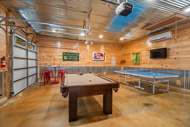 game room featuring finished concrete floors, wooden walls, and a wall mounted AC