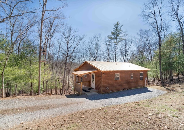 view of side of property featuring driveway