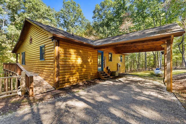 view of front facade with a carport