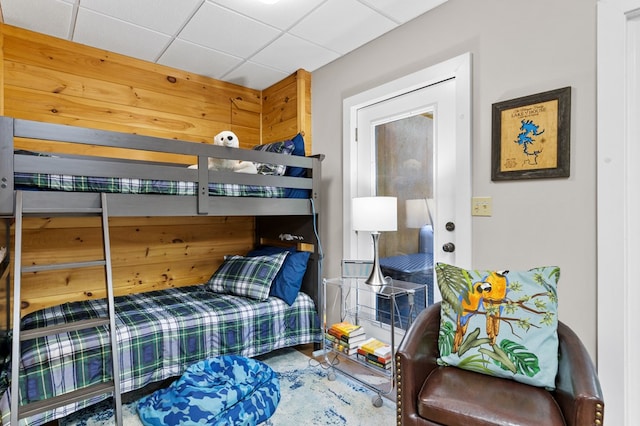 bedroom with a paneled ceiling