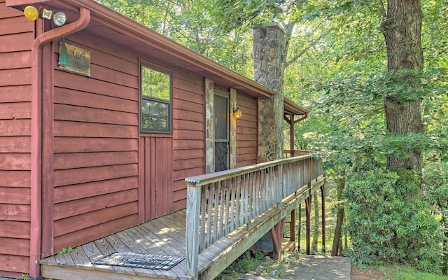 view of side of property with a deck