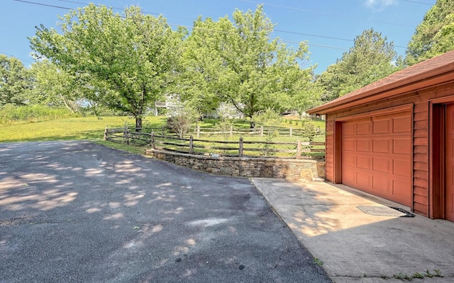 view of patio / terrace featuring a garage