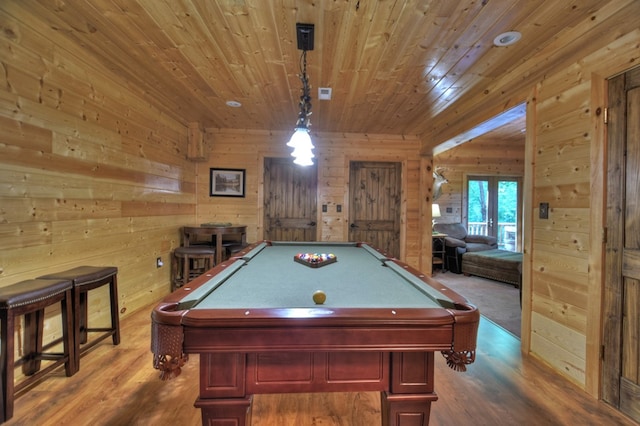 rec room featuring wood ceiling, pool table, hardwood / wood-style floors, and wooden walls