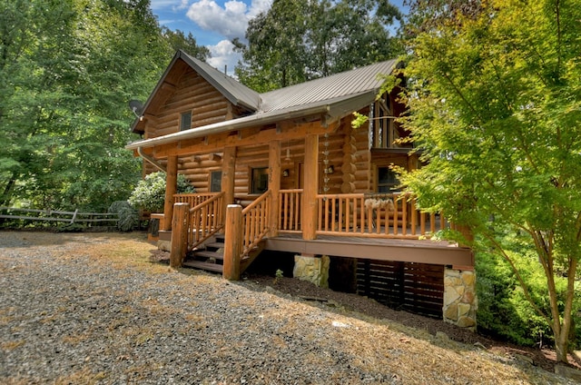 cabin with a deck