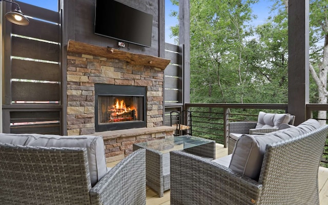 exterior space with an outdoor stone fireplace