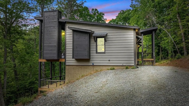 view of property exterior at dusk