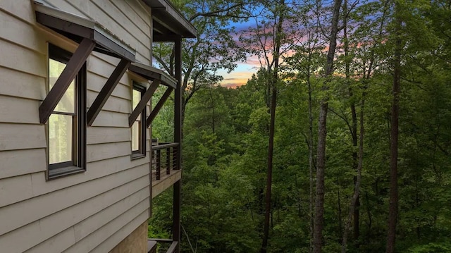 view of property exterior at dusk