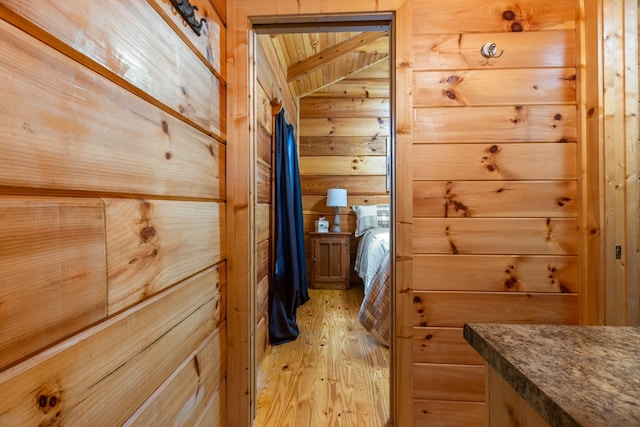 106 River Vista Dr, Dillard, GA 30537 - bedroom with wooden walls and light wood-type flooring