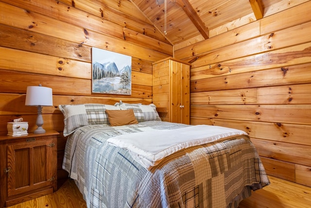 106 River Vista Dr, Dillard, GA 30537 - bedroom with wooden ceiling, light wood-style flooring, vaulted ceiling, and wood walls