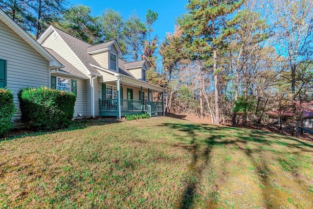 view of yard with a porch