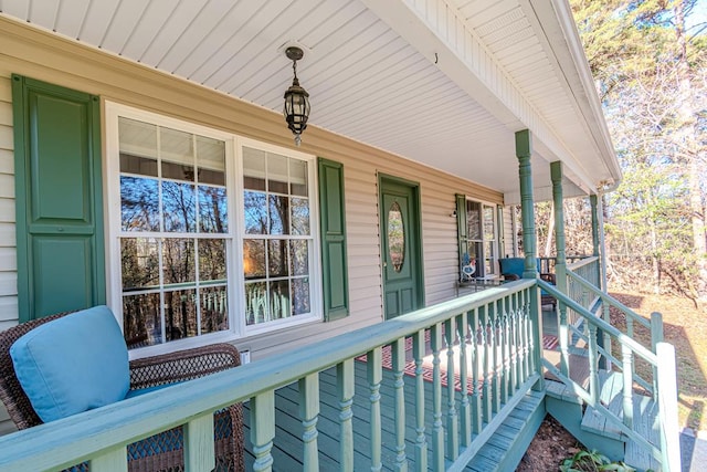 balcony featuring covered porch