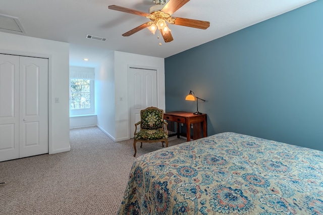 bedroom with ceiling fan, a closet, and light carpet