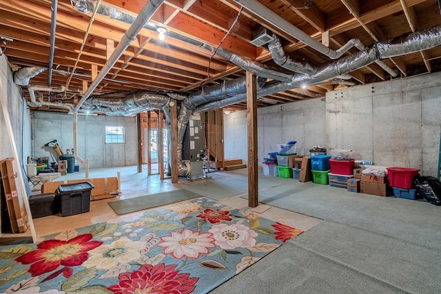 basement featuring heating unit