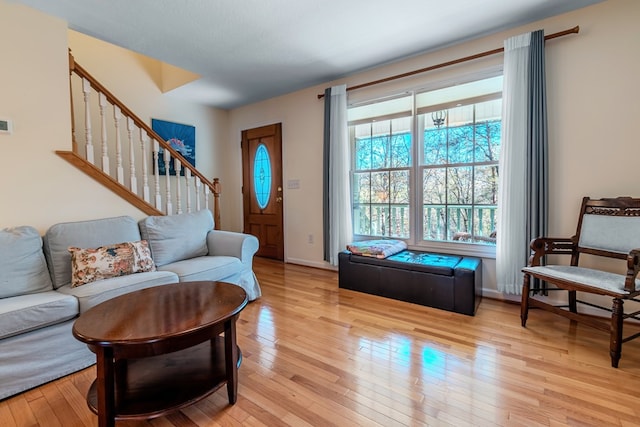 living room with light hardwood / wood-style flooring