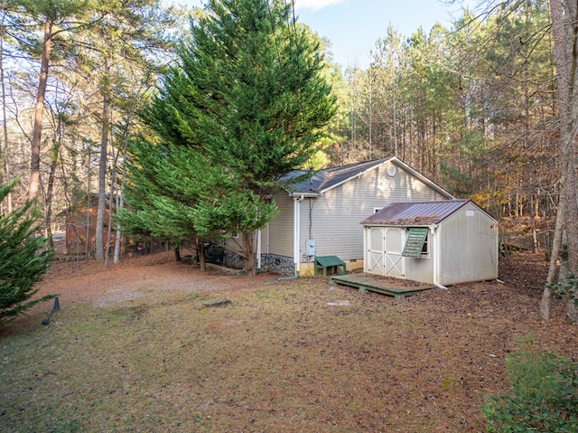 exterior space featuring a shed