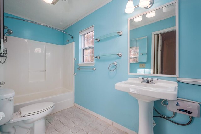 bathroom with ceiling fan, tile patterned flooring, tub / shower combination, and toilet