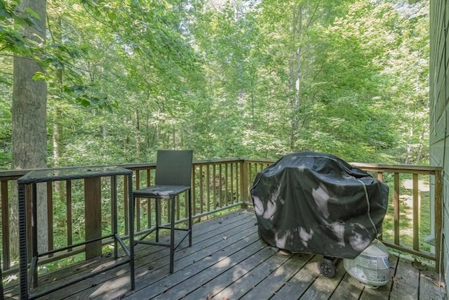 104 E Buck Run, Dahlonega, GA 30533 - wooden terrace with grilling area and a wooded view