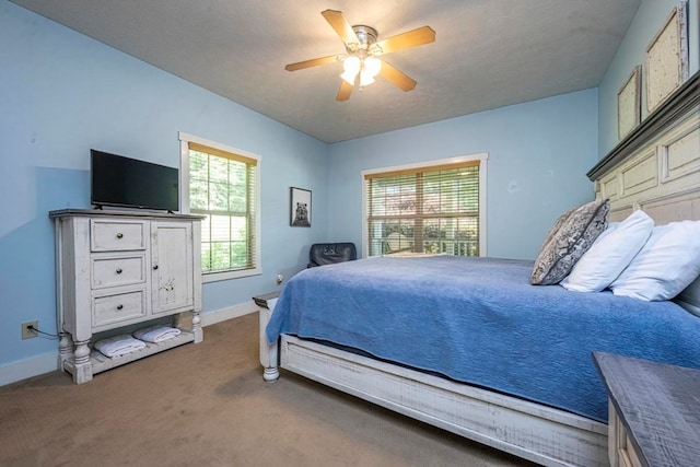 104 E Buck Run, Dahlonega, GA 30533 - carpeted bedroom featuring baseboards and ceiling fan