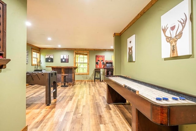 104 E Buck Run, Dahlonega, GA 30533 - playroom featuring light wood finished floors, ornamental molding, recessed lighting, and bar area