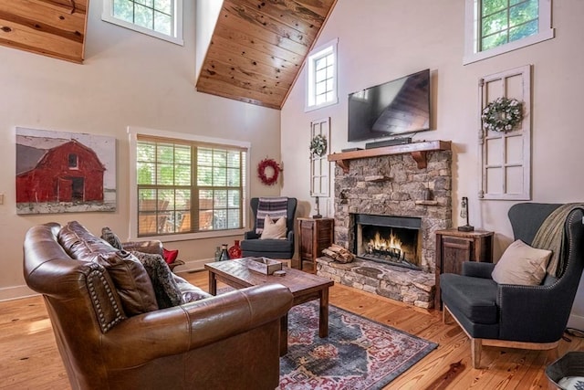 104 E Buck Run, Dahlonega, GA 30533 - living area with high vaulted ceiling, wood-type flooring, a fireplace, and wood ceiling