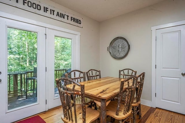 104 E Buck Run, Dahlonega, GA 30533 - dining room featuring light wood-style floors and baseboards