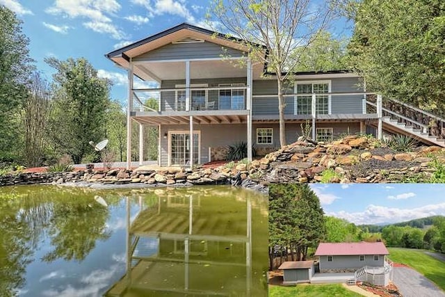 back of property with a balcony, a patio, and a water view