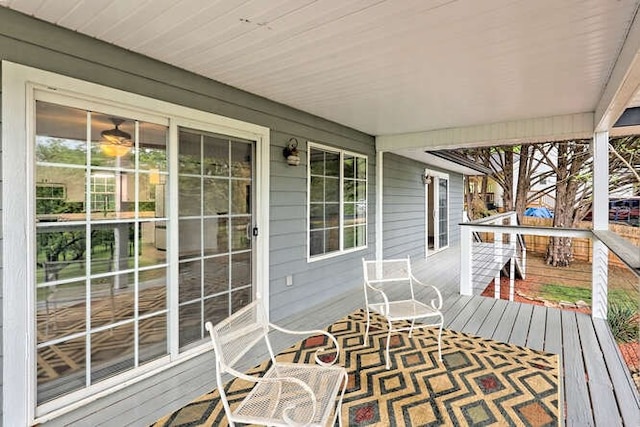 wooden terrace featuring a porch