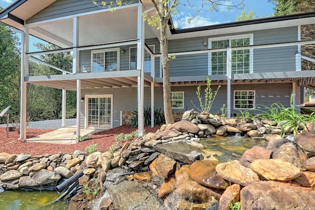 rear view of house with a patio