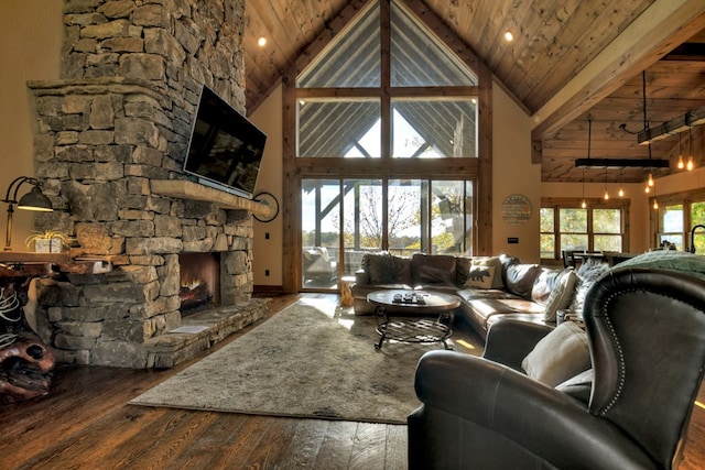 living room with dark hardwood / wood-style flooring, wooden ceiling, high vaulted ceiling, beam ceiling, and a fireplace