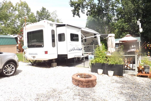 exterior space featuring a fire pit