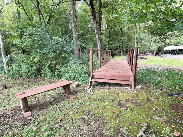 view of yard with a forest view