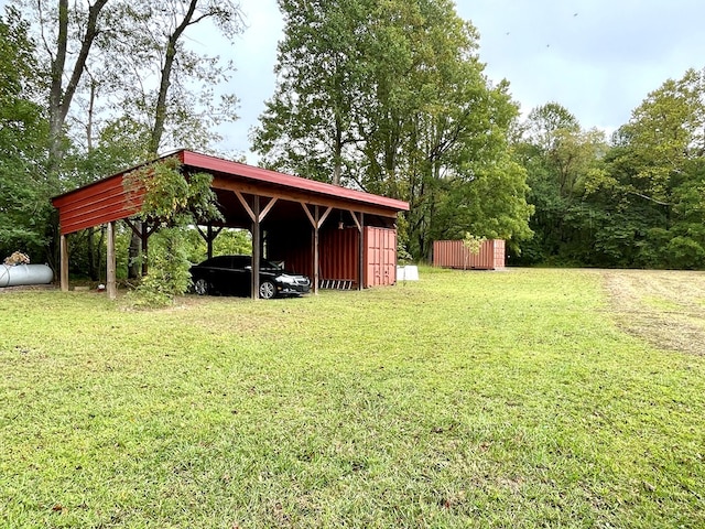 view of yard with a detached carport