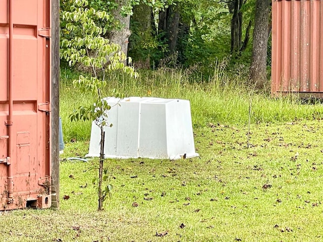 entry to storm shelter with a yard