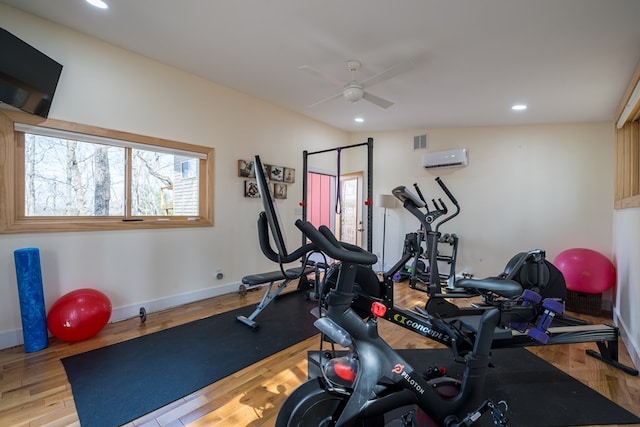 1181 Tickanetley Rd, Ellijay, GA 30536 - exercise room featuring a ceiling fan, recessed lighting, wood finished floors, and a wall mounted air conditioner