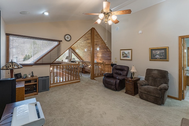 carpeted bedroom featuring high vaulted ceiling