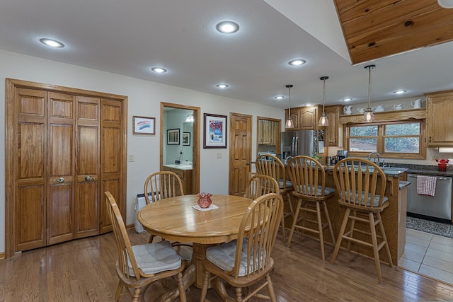 dining space featuring dark hardwood / wood-style flooring