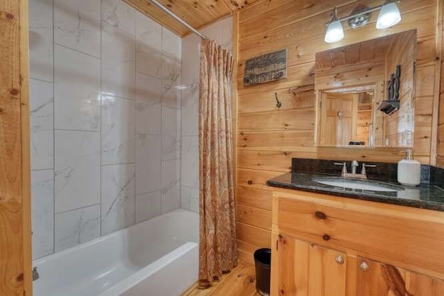 271 Kates Cove Rd, Murphy, NC 28906 - full bathroom featuring vanity, shower / bathtub combination with curtain, and wooden walls