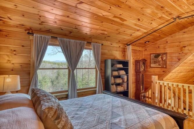271 Kates Cove Rd, Murphy, NC 28906 - bedroom with wooden ceiling, wooden walls, and lofted ceiling
