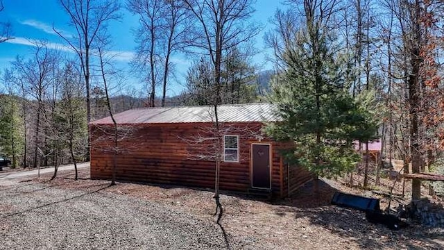271 Kates Cove Rd, Murphy, NC 28906 - view of side of property featuring faux log siding and a metal roof