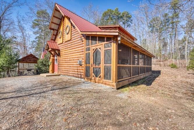 271 Kates Cove Rd, Murphy, NC 28906 - view of side of home featuring a sunroom and a metal roof