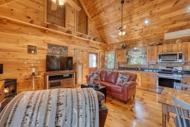 271 Kates Cove Rd, Murphy, NC 28906 - living room with wooden ceiling, light wood-type flooring, wood walls, ceiling fan, and high vaulted ceiling
