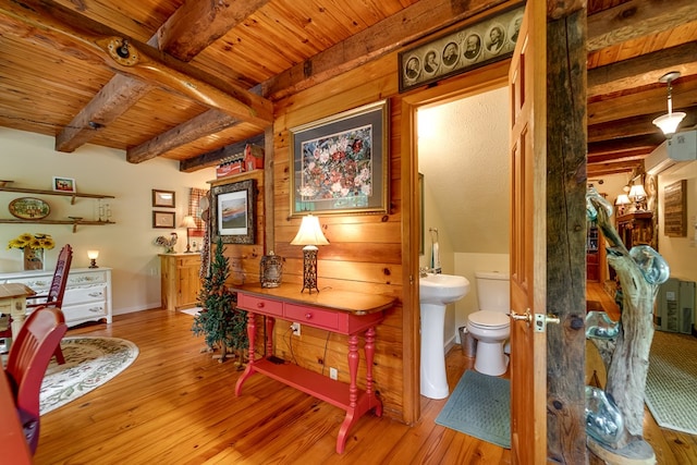 1504 Red Marble Rd, Andrews, NC 28901 - bathroom featuring a wood ceiling with exposed beams, hardwood / wood-style floors, and wood walls