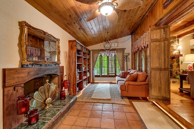 1504 Red Marble Rd, Andrews, NC 28901 - sitting room featuring a high end fireplace, lofted ceiling, tile patterned floors, a ceiling fan, and wooden ceiling