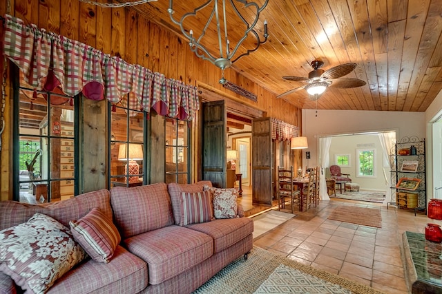 1504 Red Marble Rd, Andrews, NC 28901 - living area featuring wood walls, wooden ceiling, a ceiling fan, tile patterned flooring, and lofted ceiling