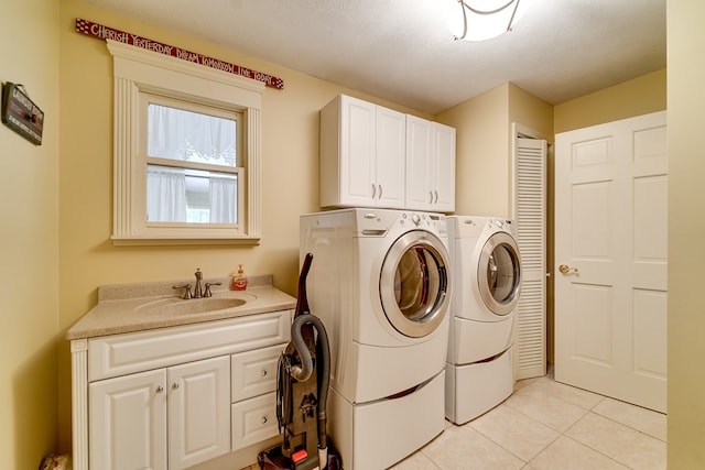 1504 Red Marble Rd, Andrews, NC 28901 - laundry room featuring cabinet space, washer and clothes dryer, and light tile patterned flooring